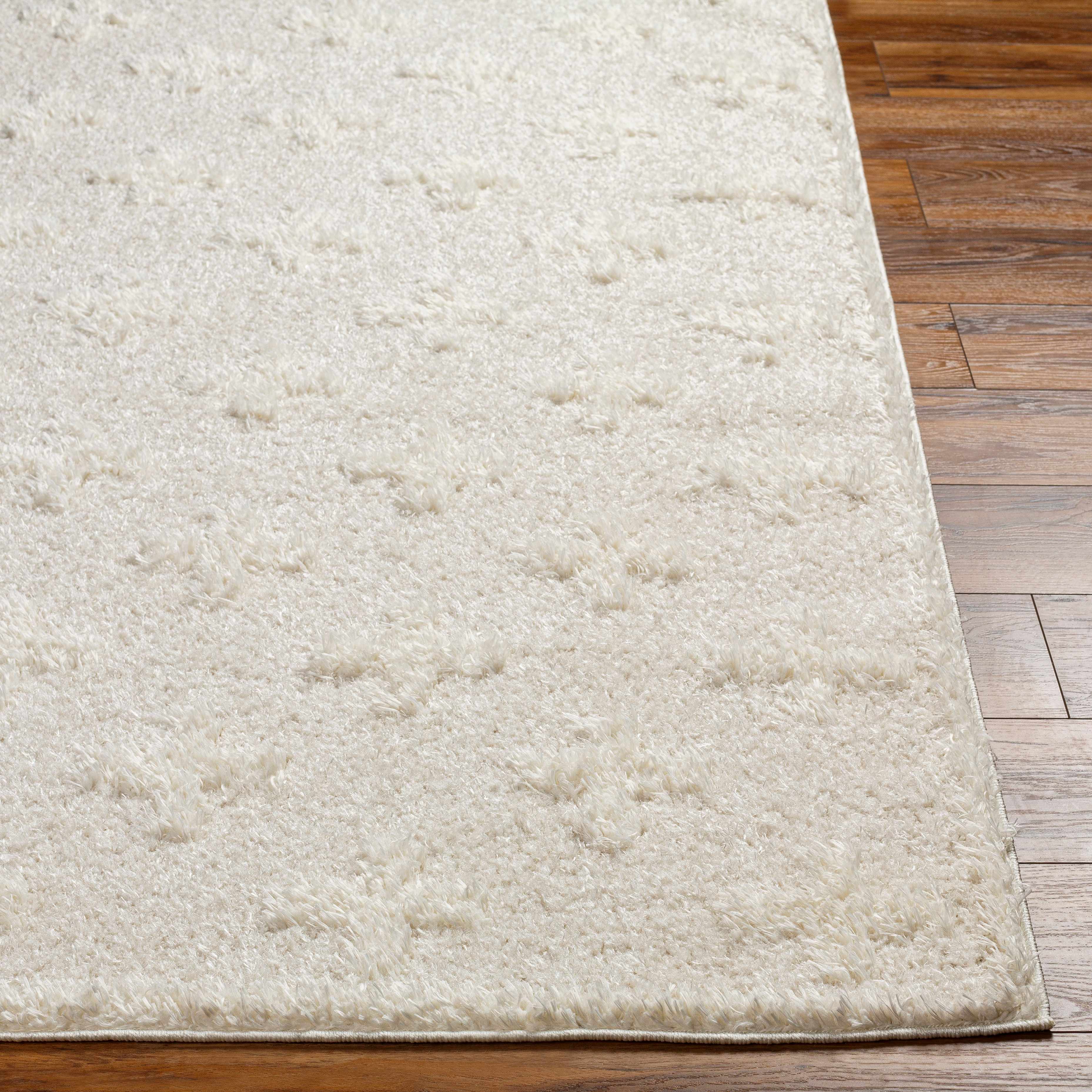 Luxurious Hauteloom Satu Cream Area Rug