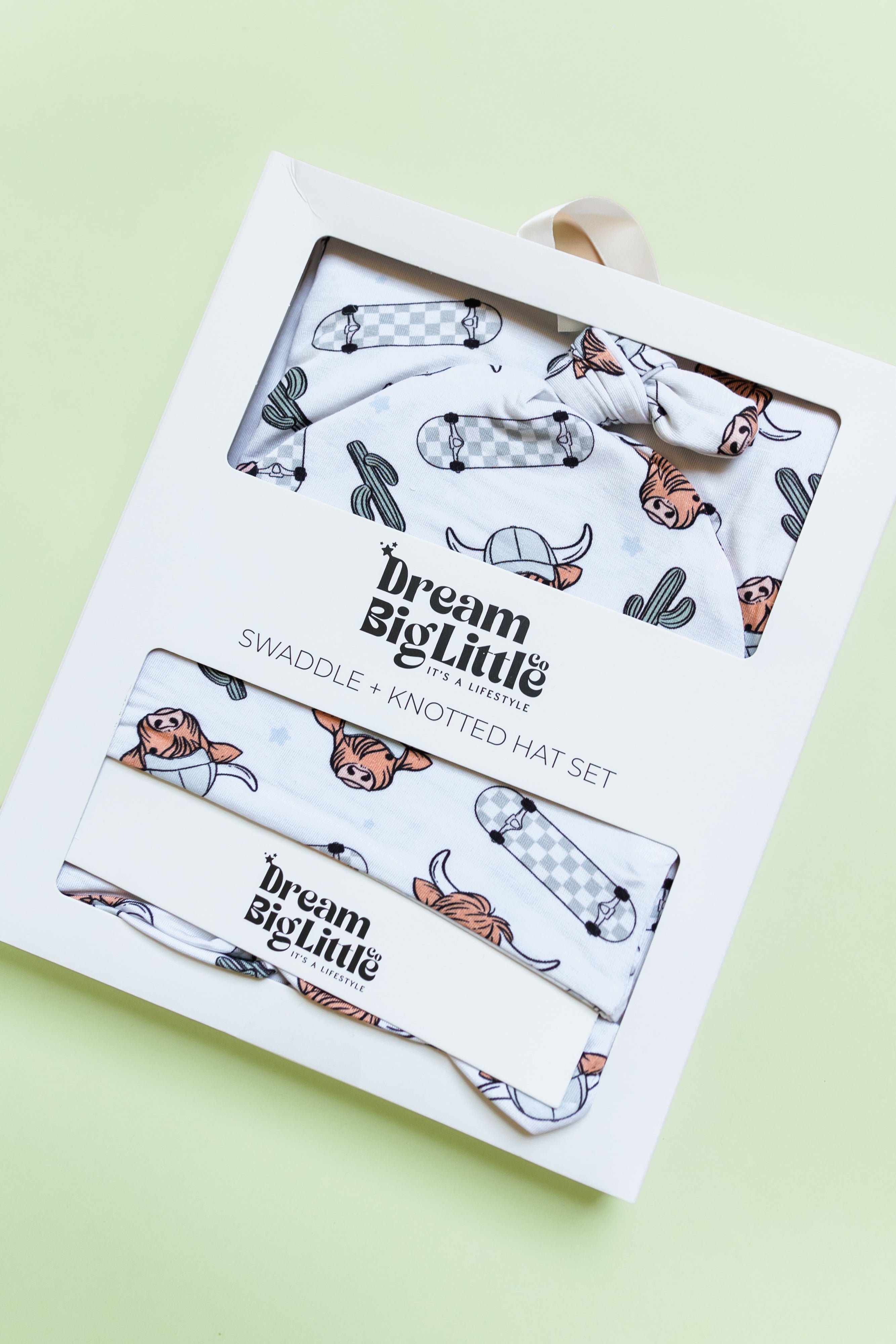 Exclusive Cow Print Skateboard Swaddle & Beanie Set - Dream Big Little Co
