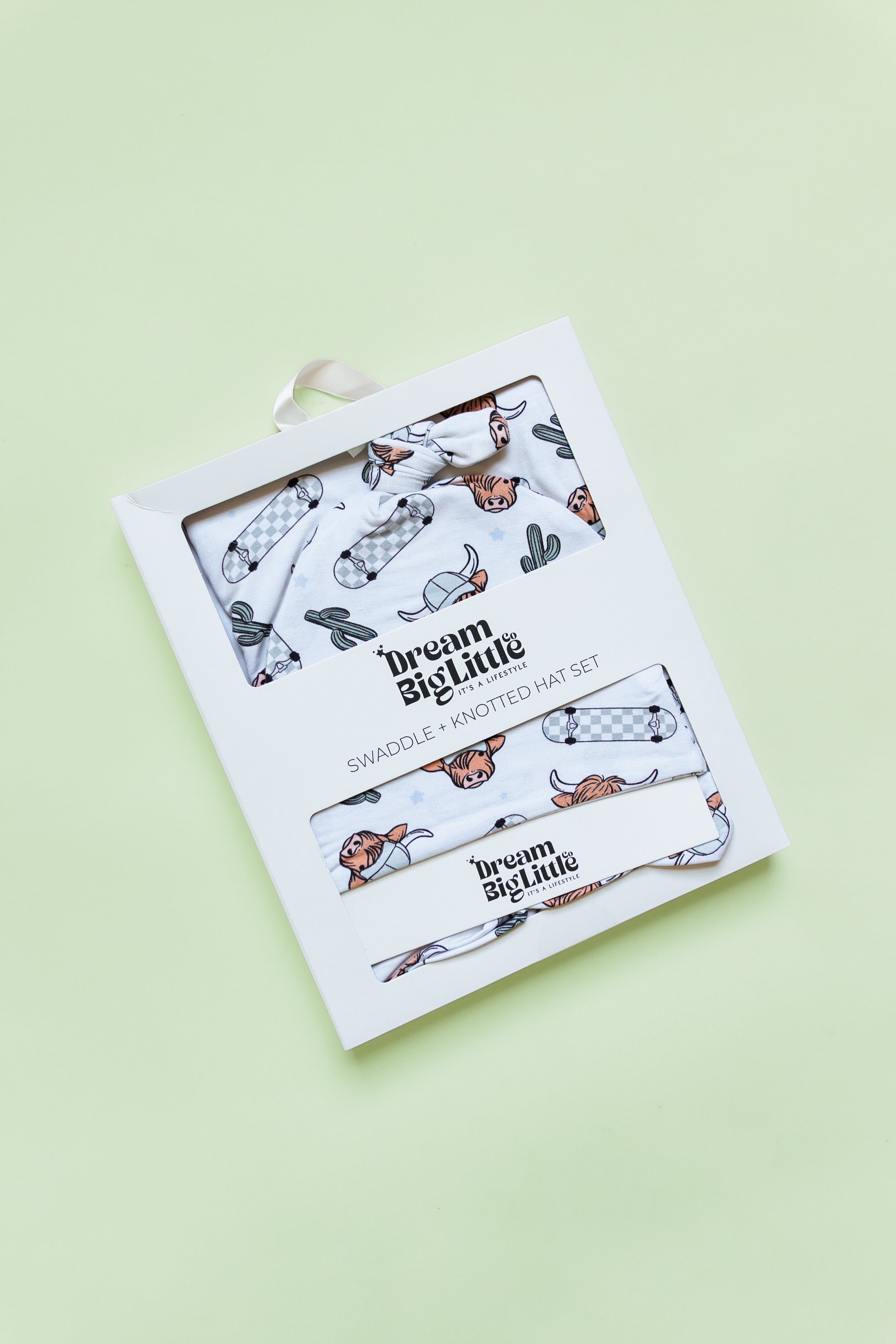 Exclusive Cow Print Skateboard Swaddle & Beanie Set - Dream Big Little Co