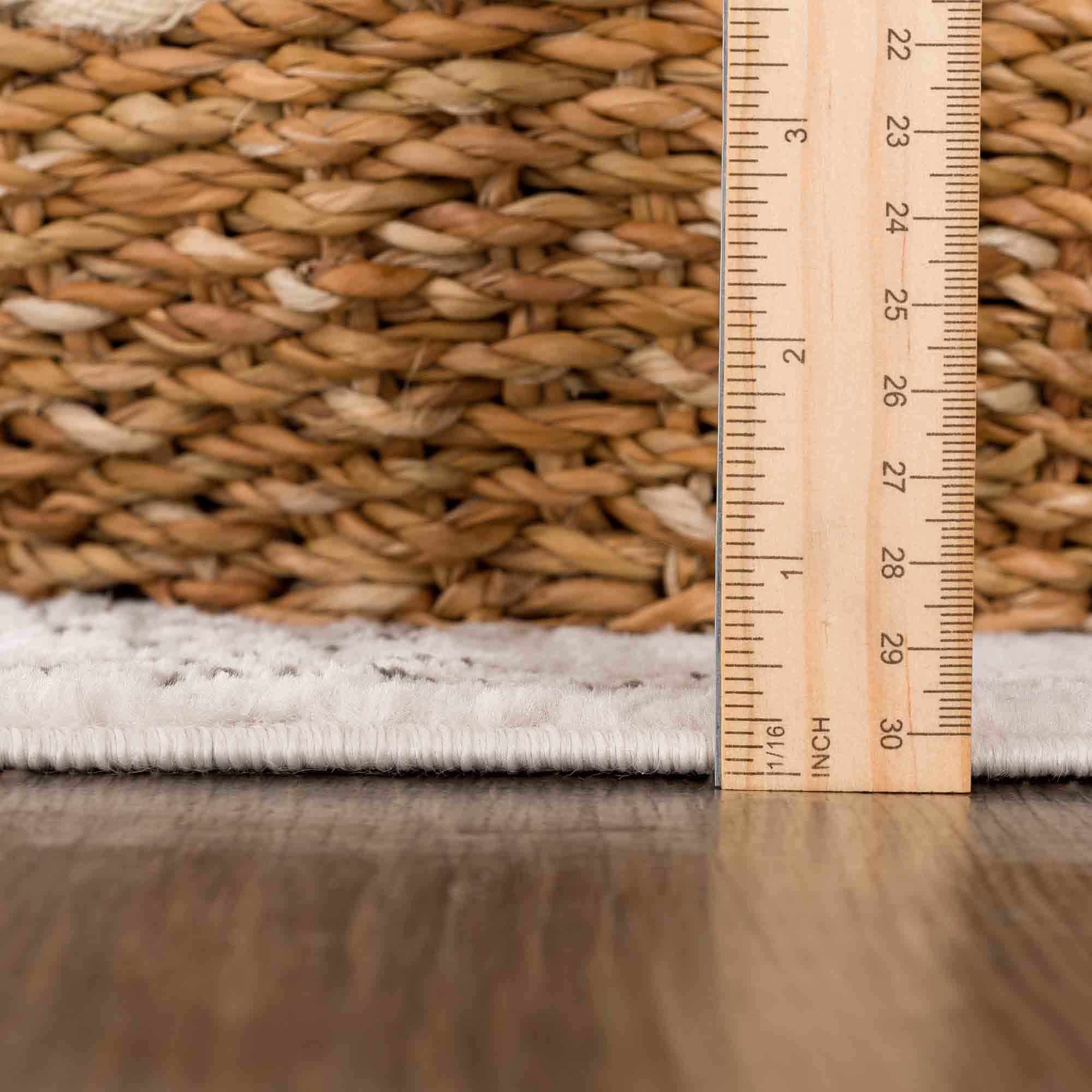 Hauteloom Divya Cream Tribal Rug - A Stunning Performance Piece