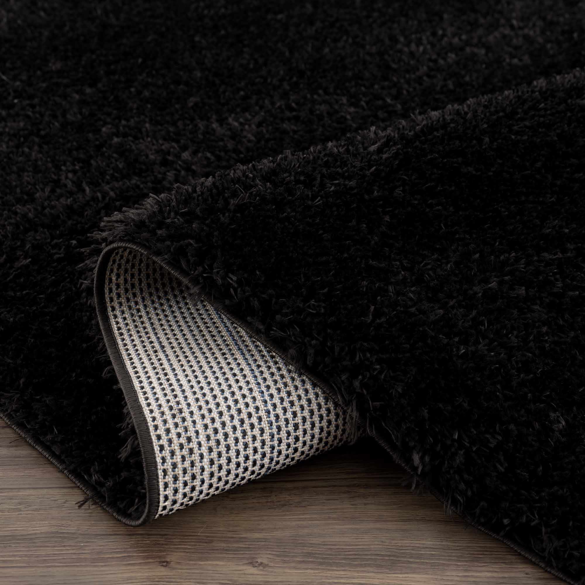Luxurious Hauteloom Faina Solid Black Shag Rug - Effortlessly Washable!