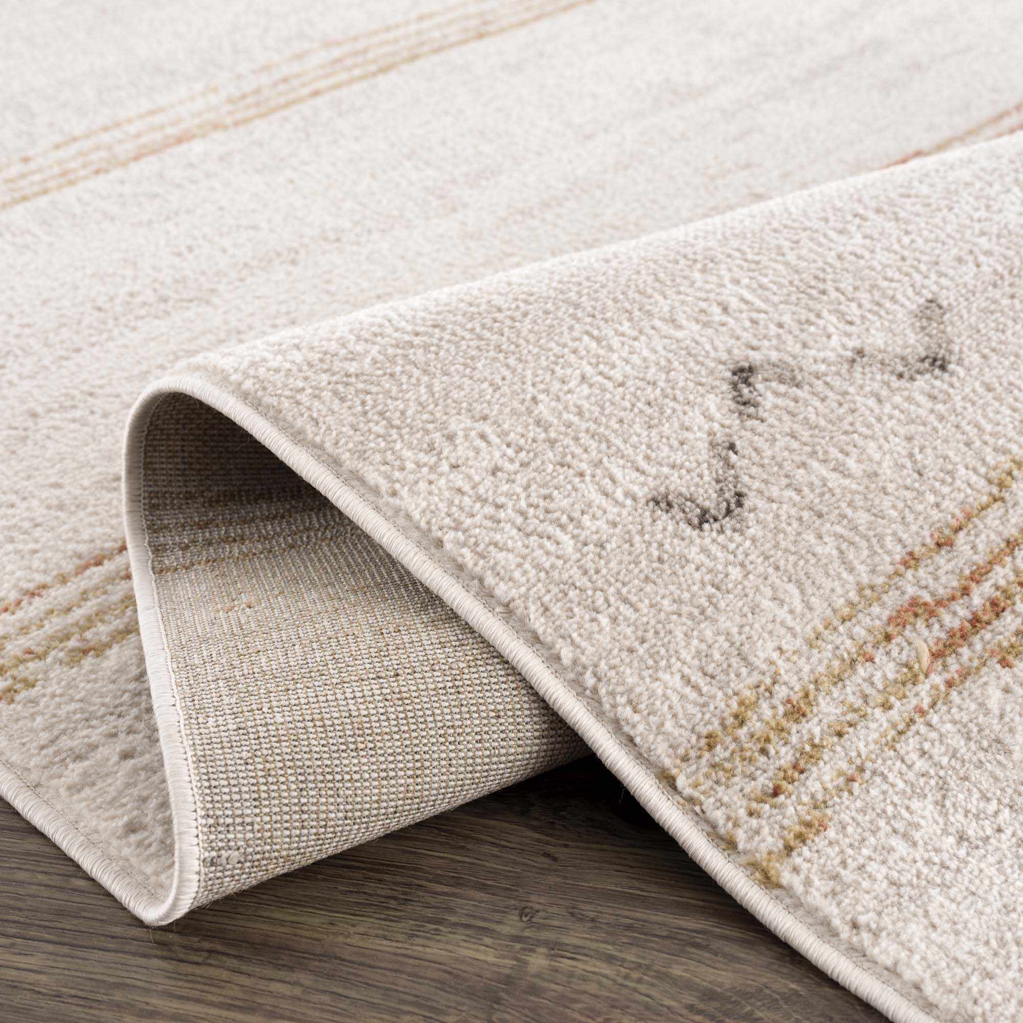 Elegant Hauteloom Deja Cream & Gold Area Rug