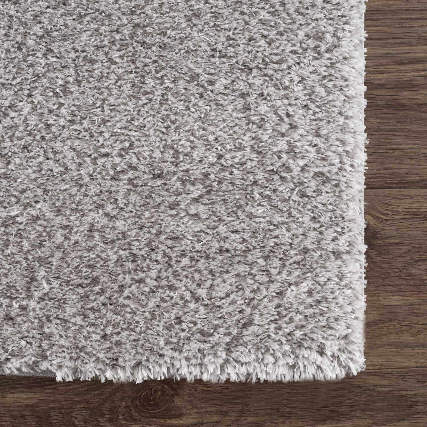 Indulge in Luxury with Hauteloom Heavenly Solid Light Gray Plush Rug