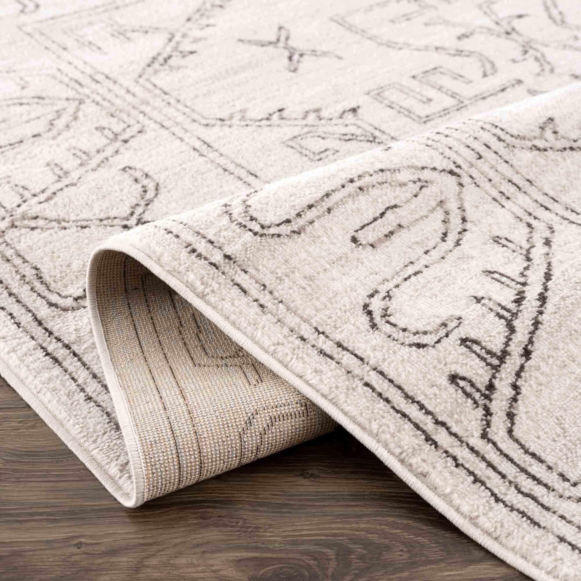 Hauteloom Divya Cream Tribal Rug - A Stunning Performance Piece