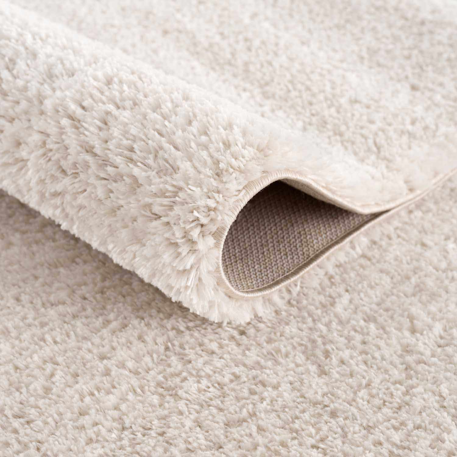 Indulge in Luxury: Hauteloom Heavenly Solid Beige Plush Rug