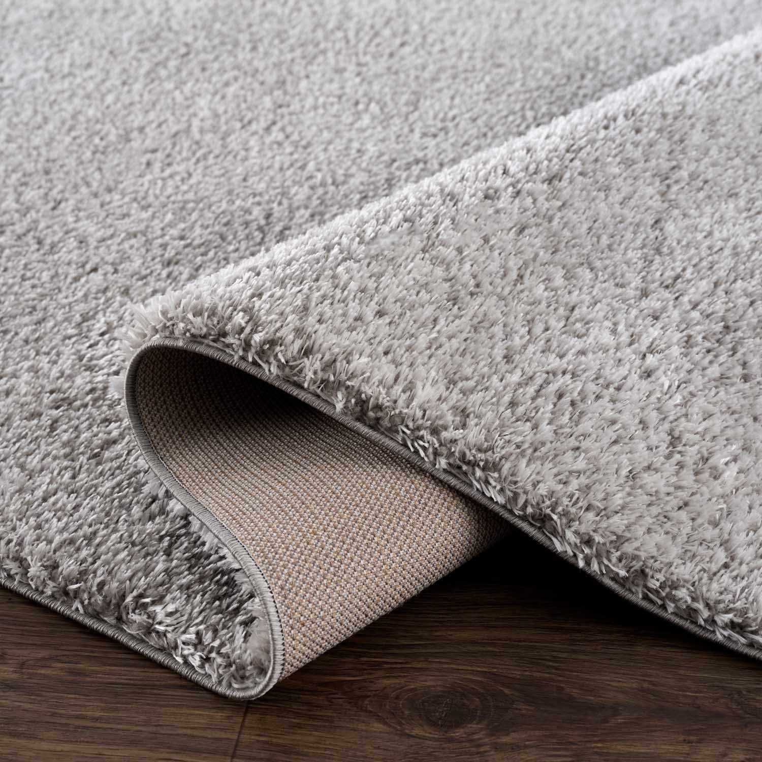 Indulge in Luxury with Hauteloom Heavenly Solid Light Gray Plush Rug