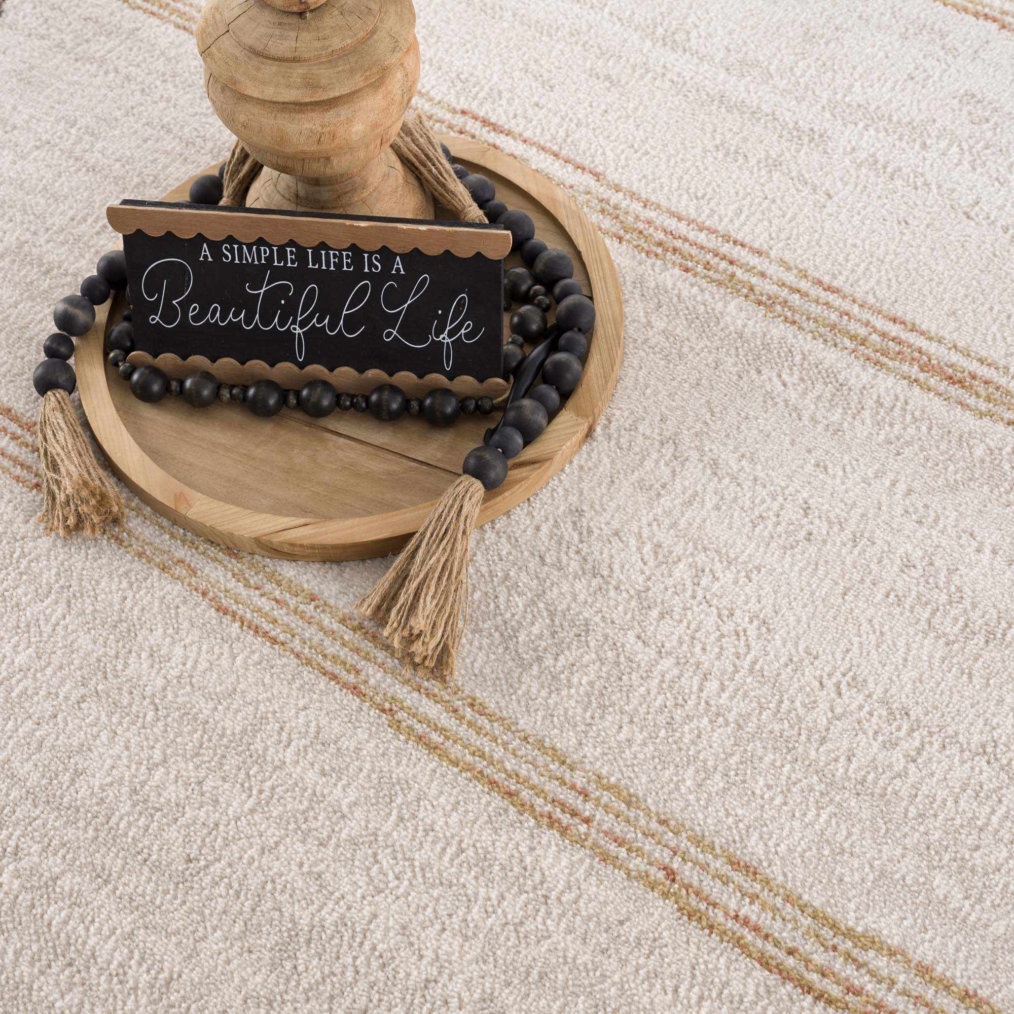 Elegant Hauteloom Deja Cream & Gold Area Rug