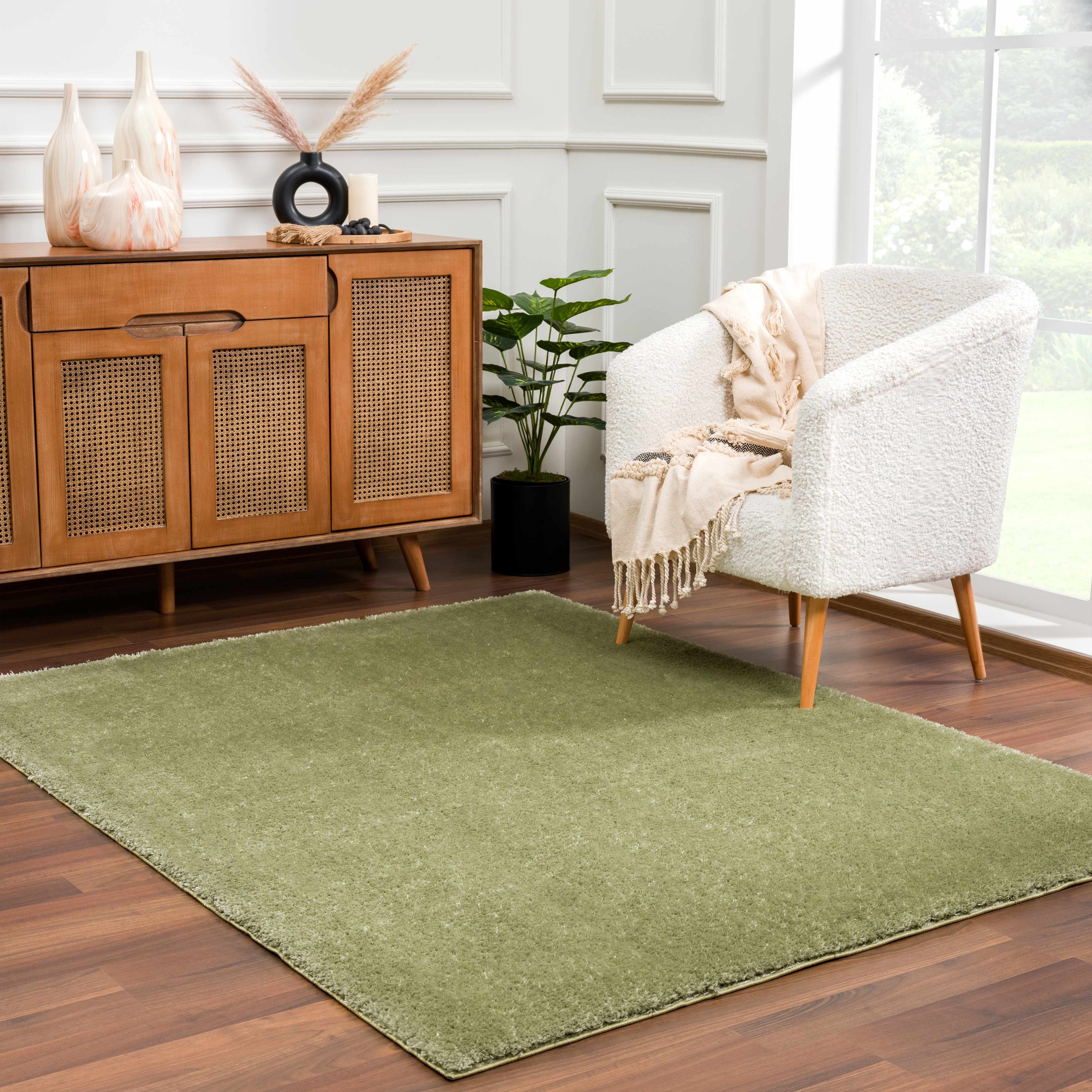 Indulge in Luxury with Hauteloom Heavenly Solid Green Plush Rug