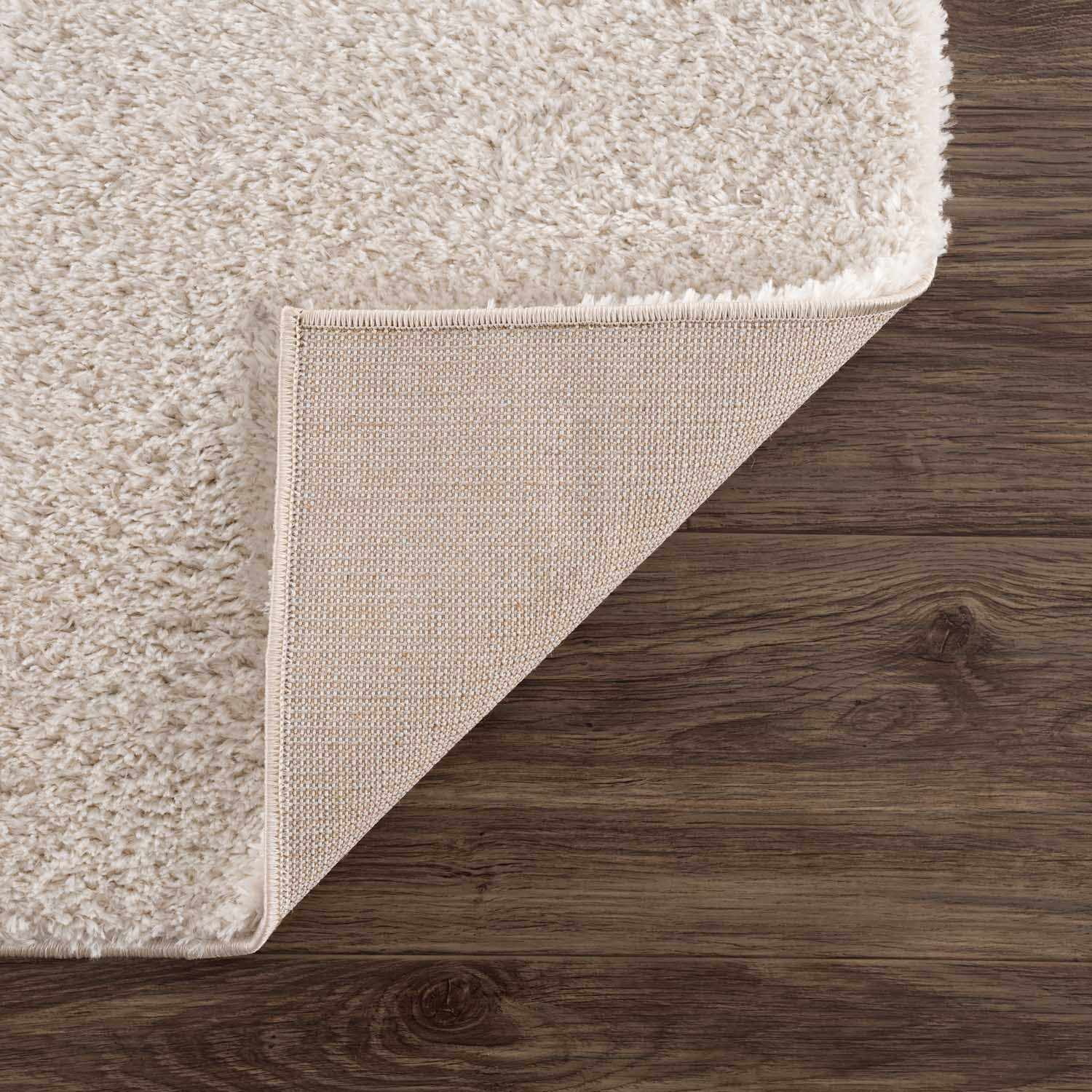 Indulge in Luxury: Hauteloom Heavenly Solid Beige Plush Rug
