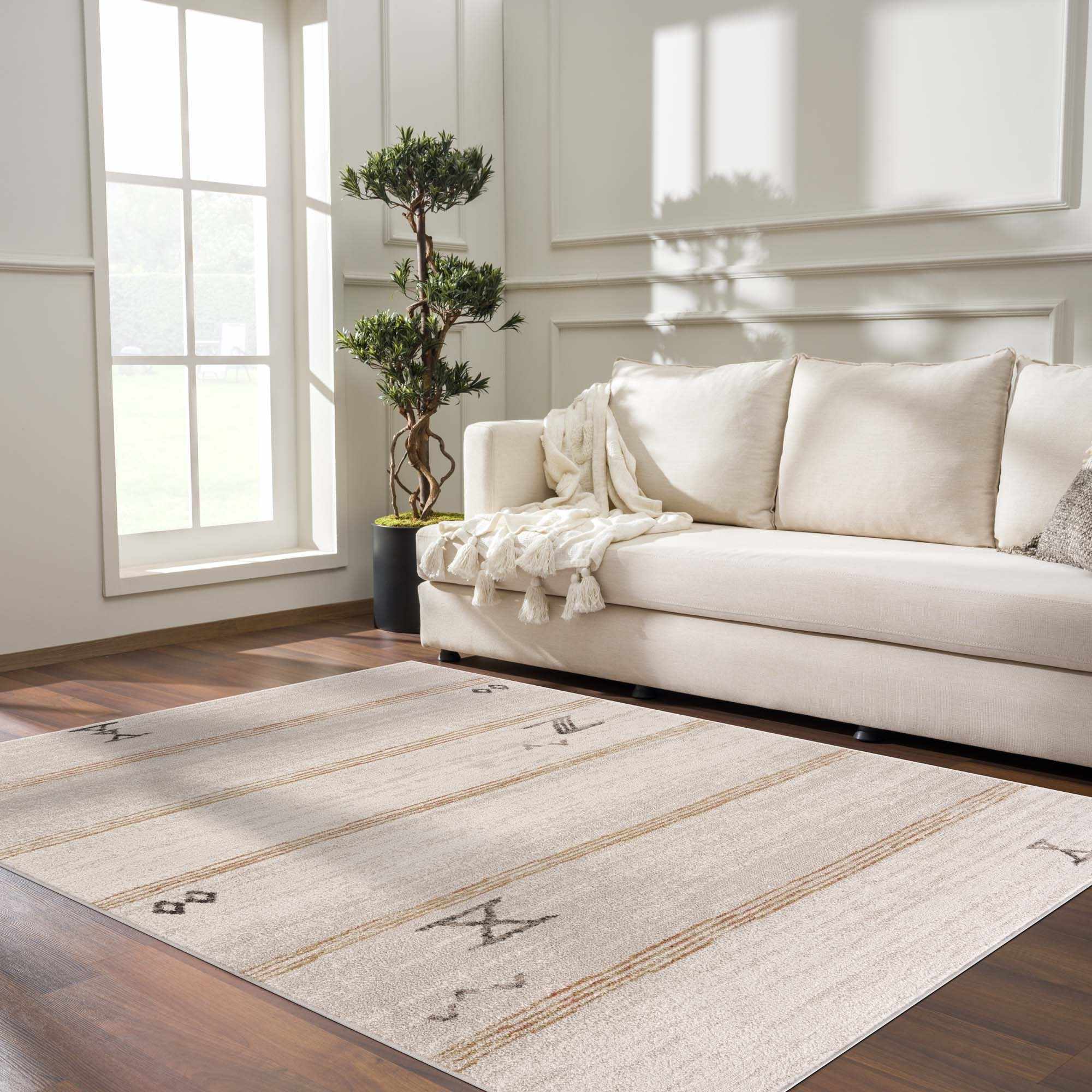 Elegant Hauteloom Deja Cream & Gold Area Rug