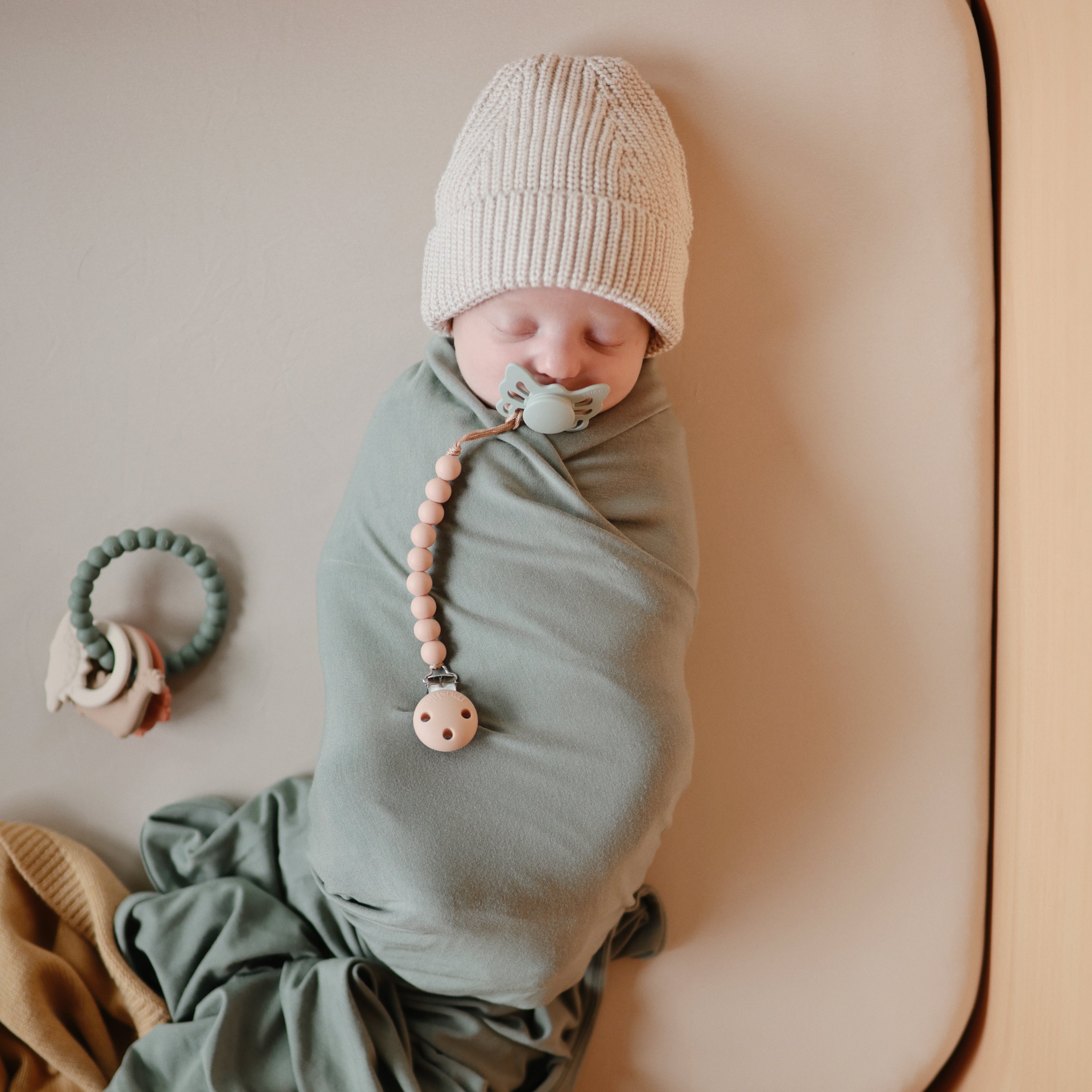Mushie's Adorable Dino Teething Ring - A Chewy Delight for Little Ones!