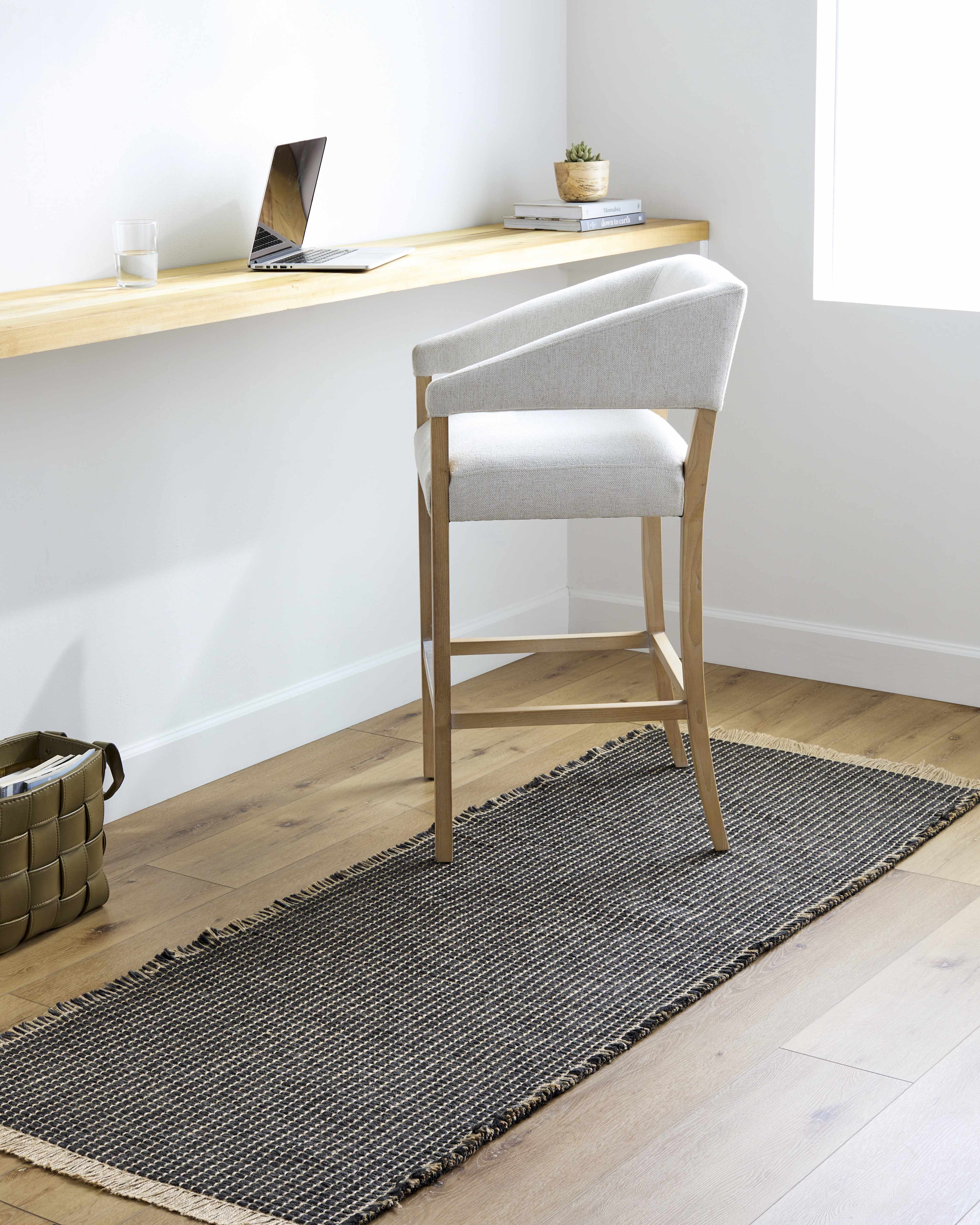 Elevate Your Space with Hauteloom Kimi Jute Black Area Rug by Surya X Becki Owens