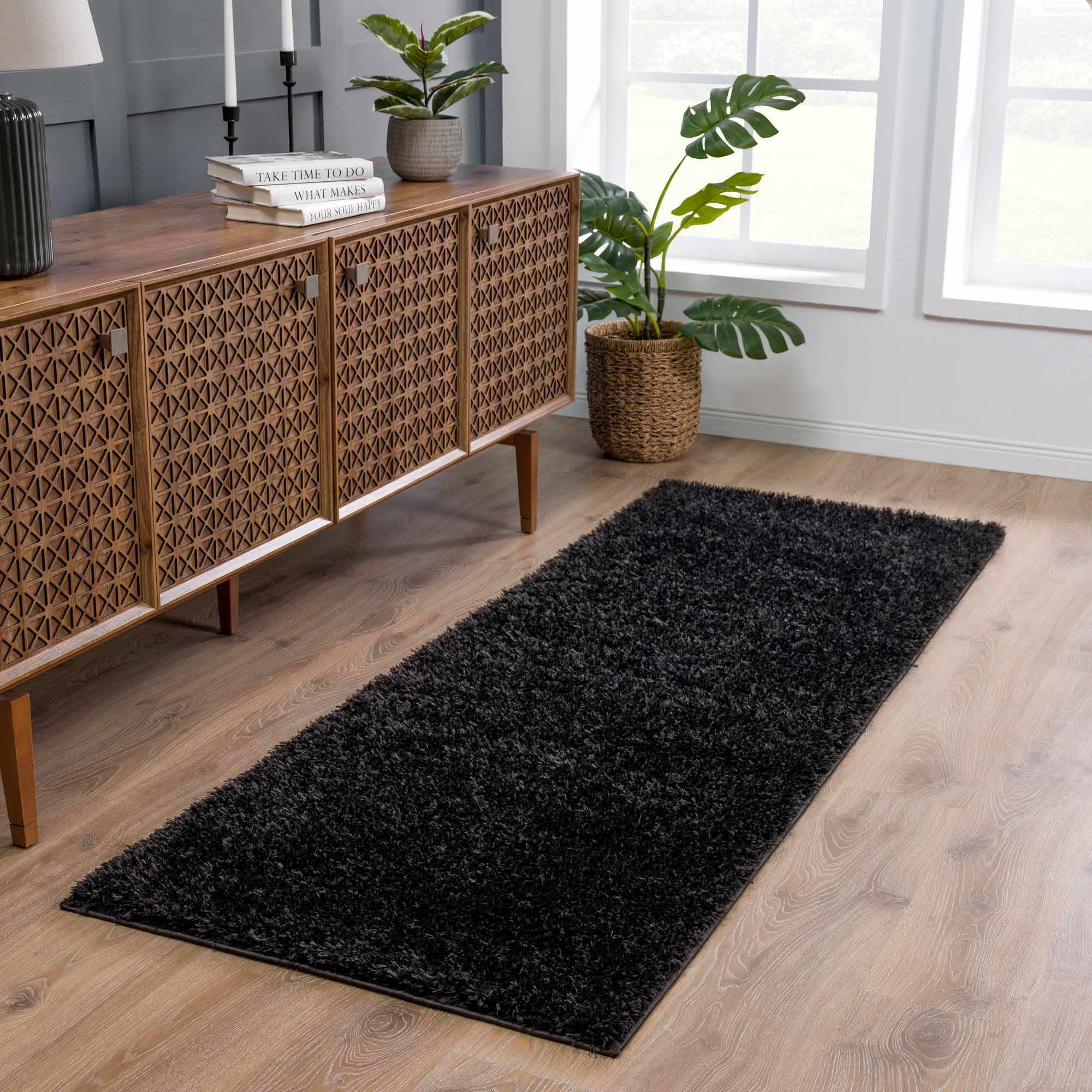 Luxurious Hauteloom Faina Solid Black Shag Rug - Effortlessly Washable!