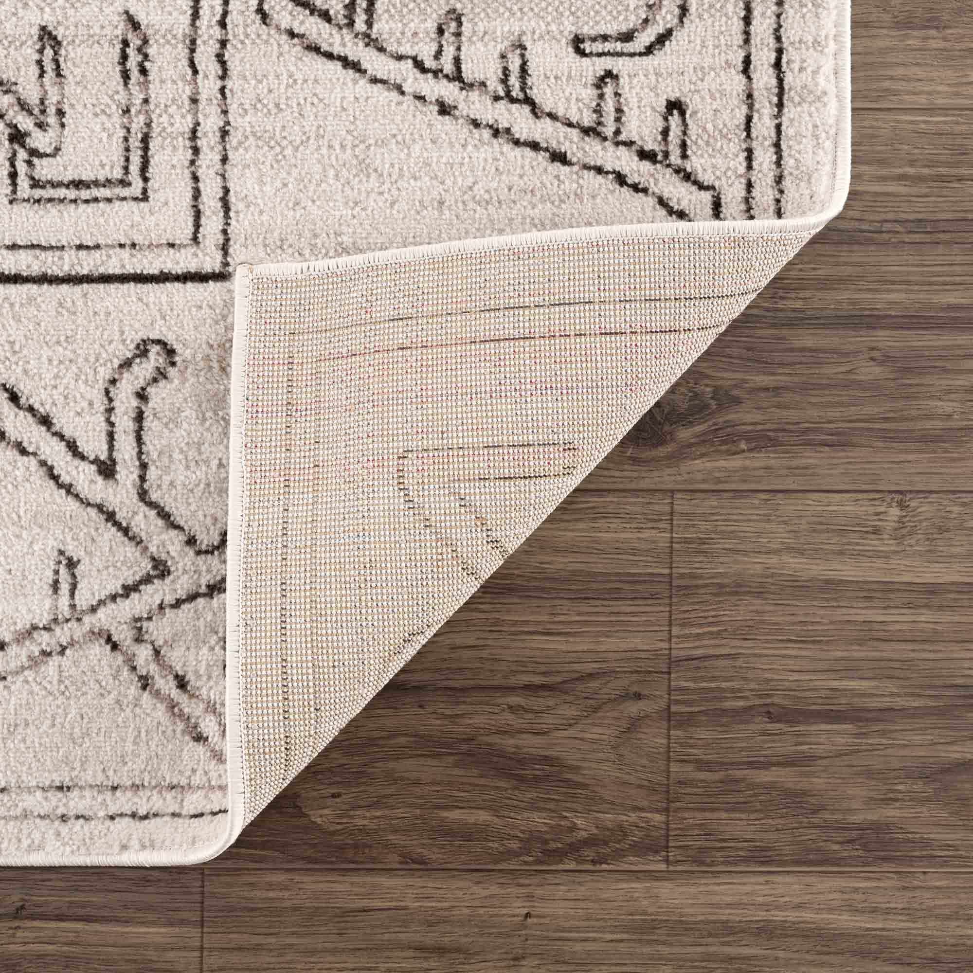 Hauteloom Divya Cream Tribal Rug - A Stunning Performance Piece