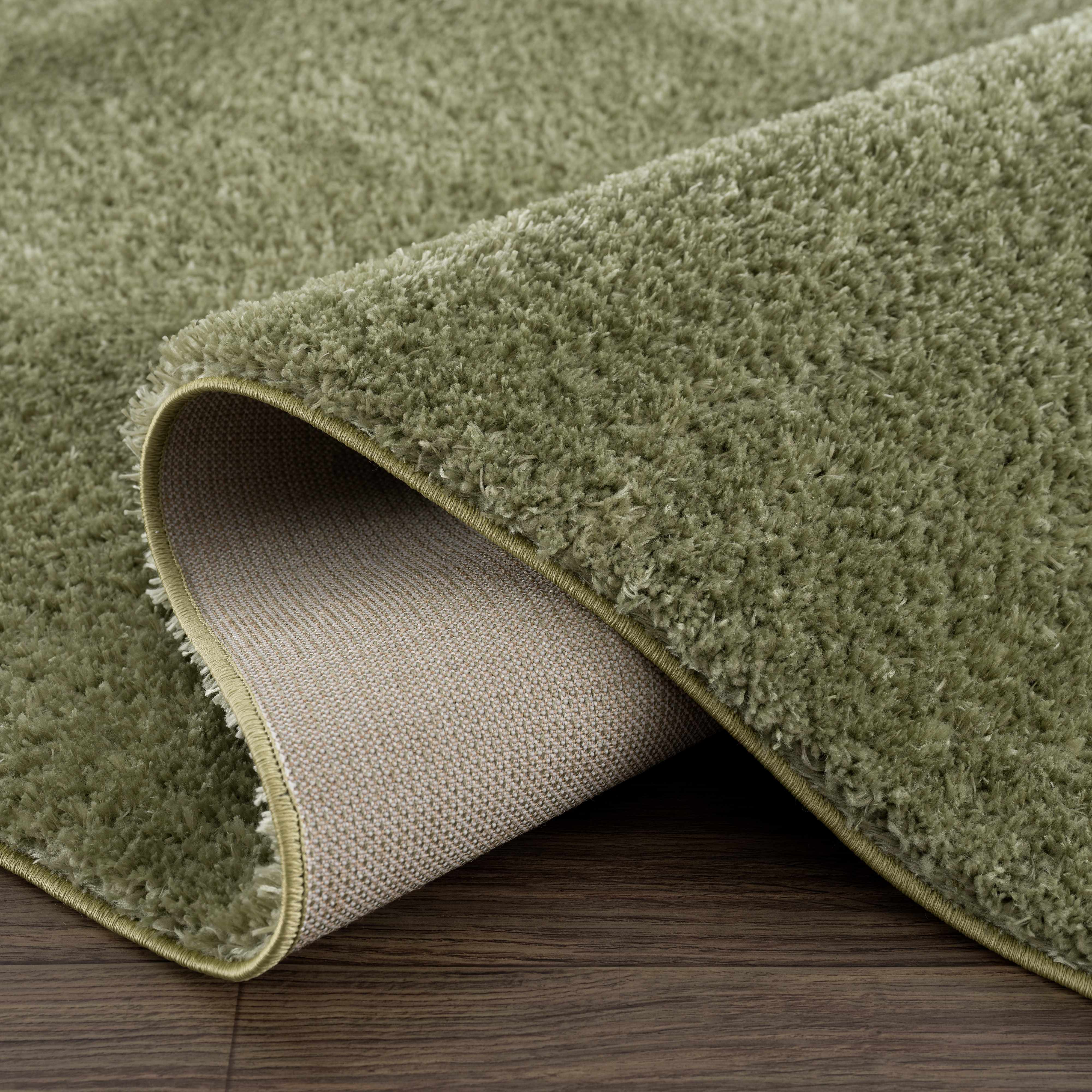 Indulge in Luxury with Hauteloom Heavenly Solid Green Plush Rug