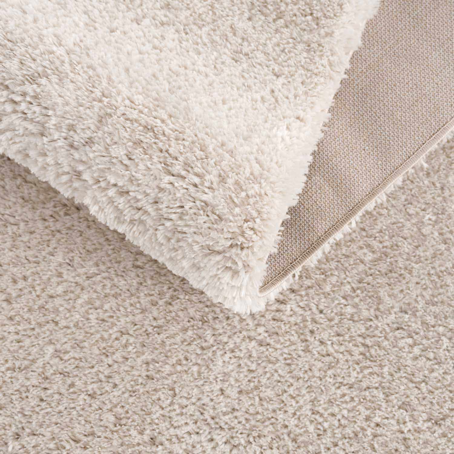 Indulge in Luxury: Hauteloom Heavenly Solid Beige Plush Rug