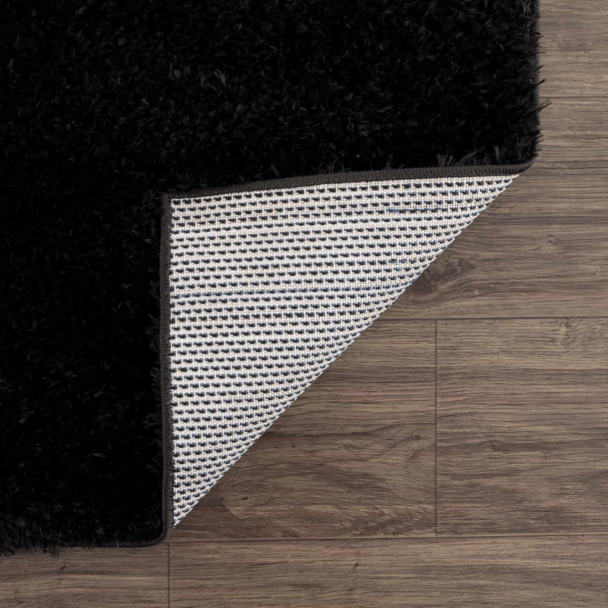 Luxurious Hauteloom Faina Solid Black Shag Rug - Effortlessly Washable!