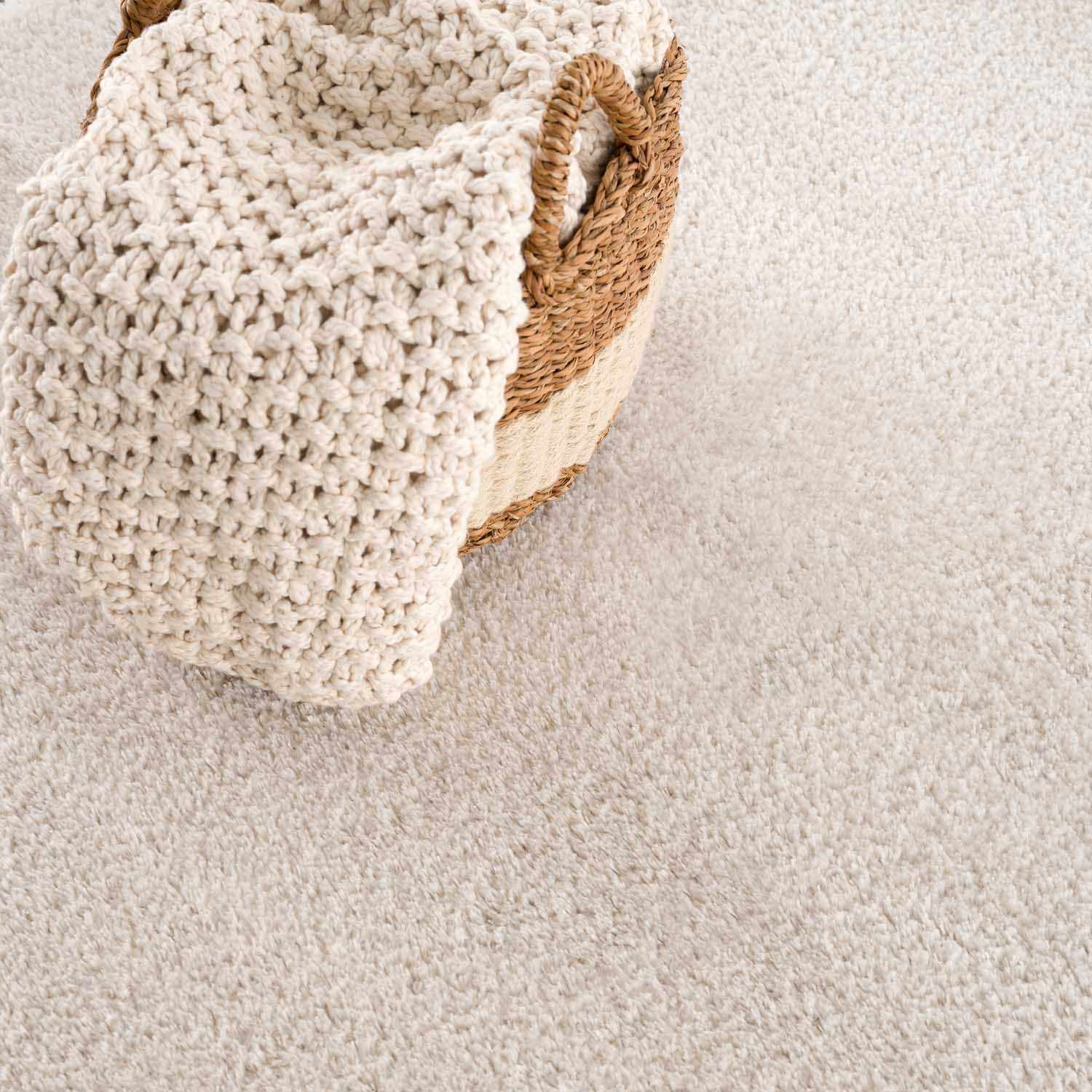 Indulge in Luxury: Hauteloom Heavenly Solid Beige Plush Rug