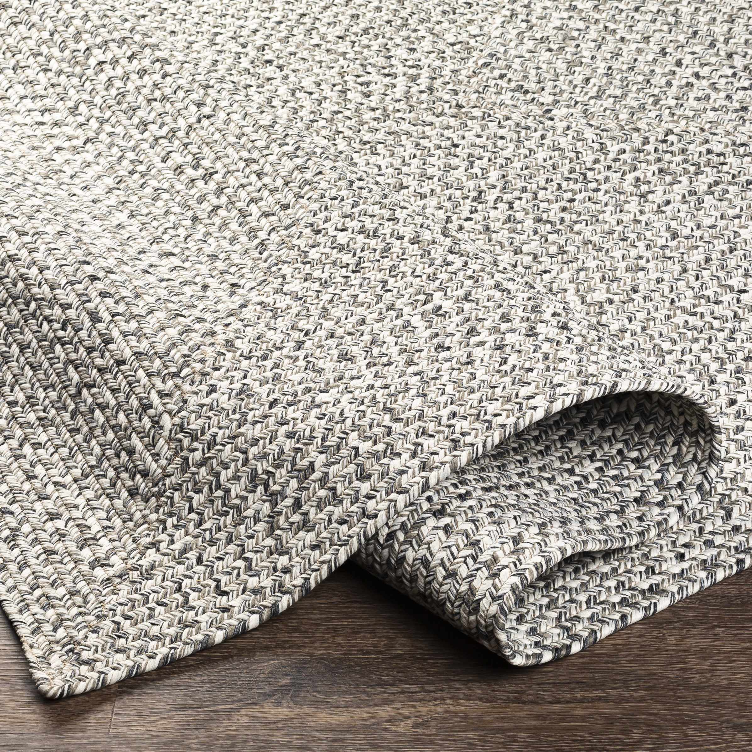 Hauteloom Cream Charcoal Braided Faux Jute Rug - A Stylish and Durable Addition to Your Space