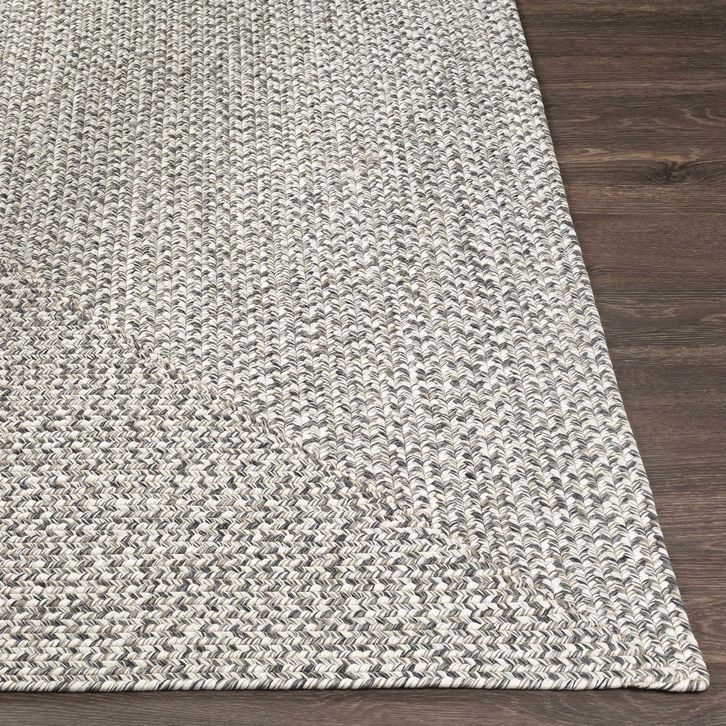 Hauteloom Cream Charcoal Braided Faux Jute Rug - A Stylish and Durable Addition to Your Space