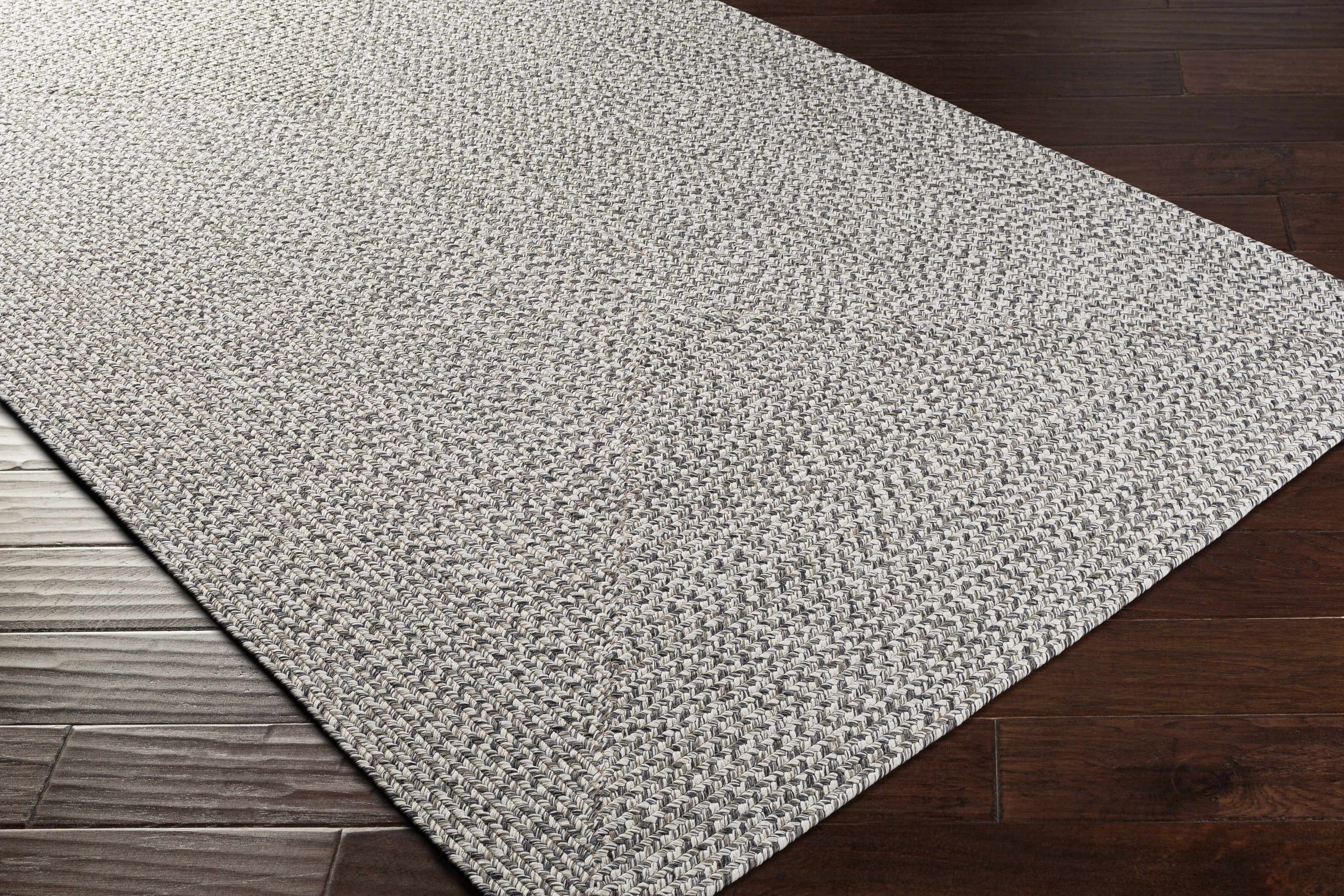 Hauteloom Cream Charcoal Braided Faux Jute Rug - A Stylish and Durable Addition to Your Space