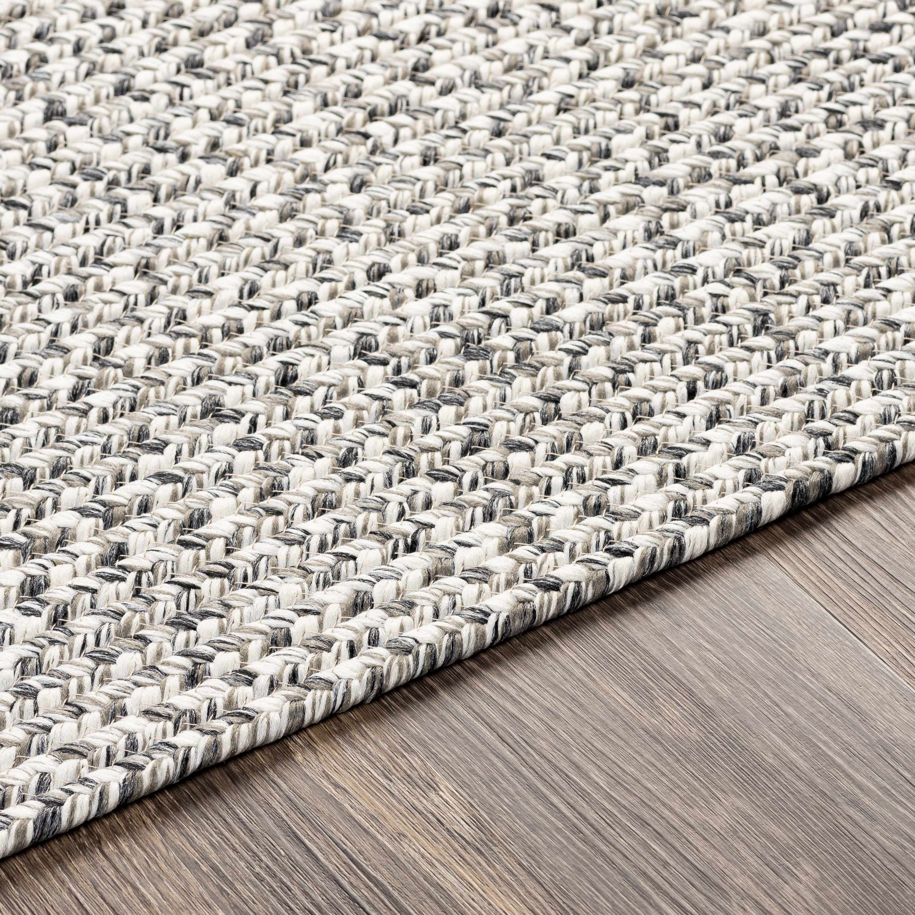 Hauteloom Cream Charcoal Braided Faux Jute Rug - A Stylish and Durable Addition to Your Space